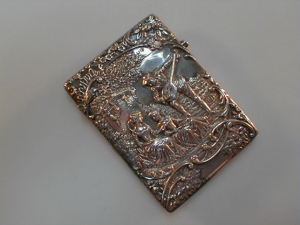 Appraisal: A Victorian silver card case repouss with two ladies in