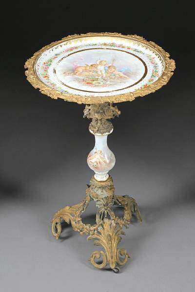 Appraisal: A Napoleon III gilt bronze and Sevres style porcelain gueridon