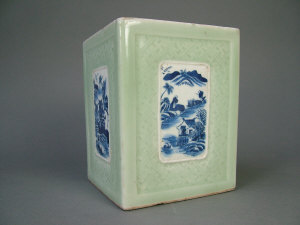 Appraisal: Chinese celadon ground brush pot of square section with moulded