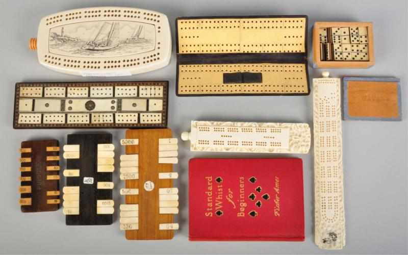 Appraisal: Lot of Cribbage Boards Whist Counters Condition Excellent Size Largest