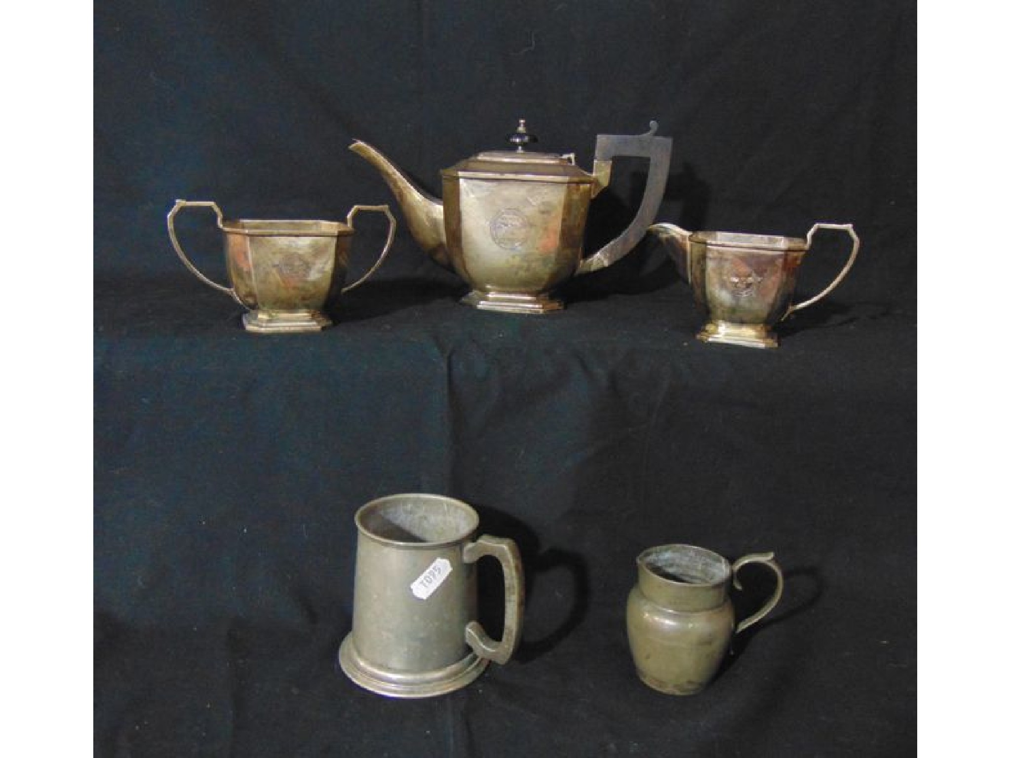 Appraisal: A three piece tea set comprising teapot two handled sugar