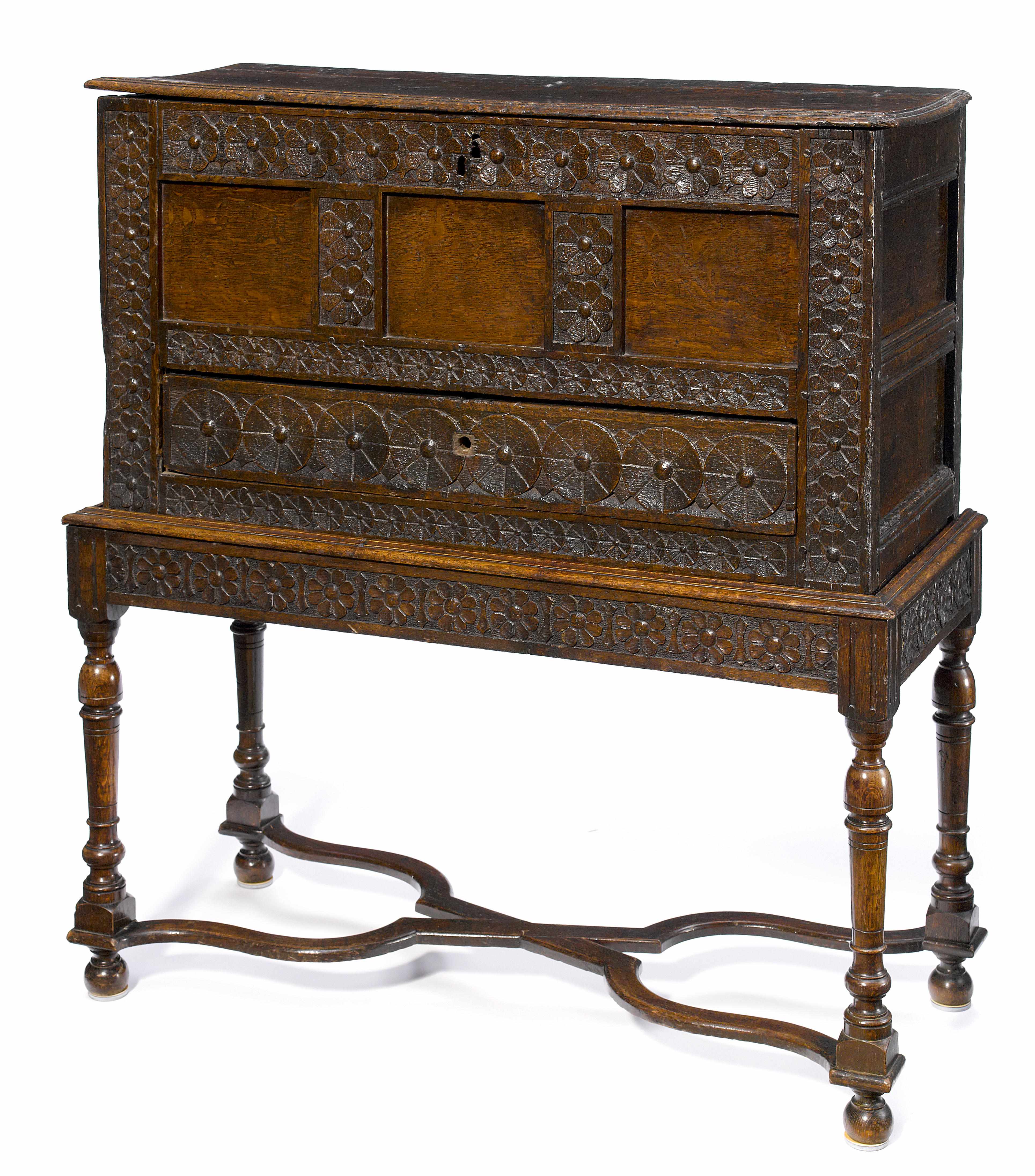 Appraisal: A Continental Baroque carved oak mule chest on later stand