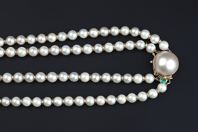 Appraisal: A DOUBLE STRAND CULTURED PEARL NECKLACE the uniform cultured pearls