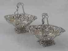 Appraisal: A pair of Victorian silver pierced bon-bon dishes designed as