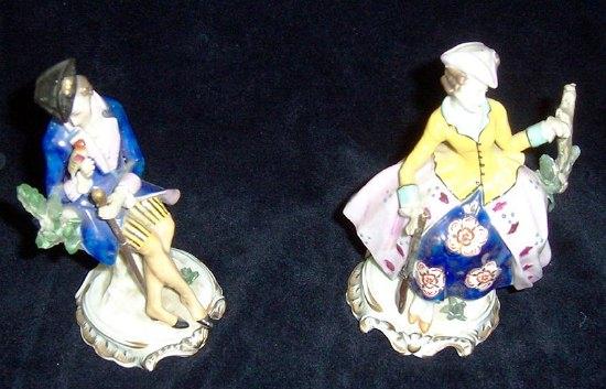 Appraisal: A pair of th Century Continental figures a seated gentleman