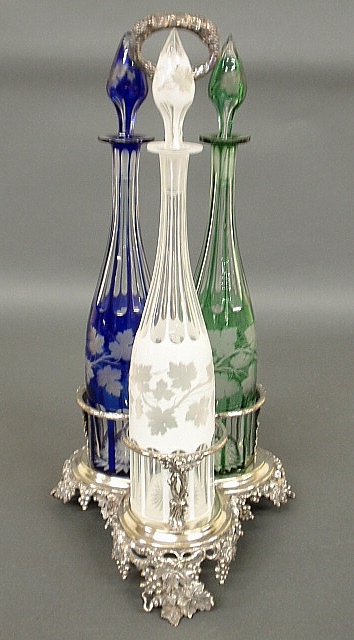 Appraisal: - Three etched glass wine decanters one clear one blue