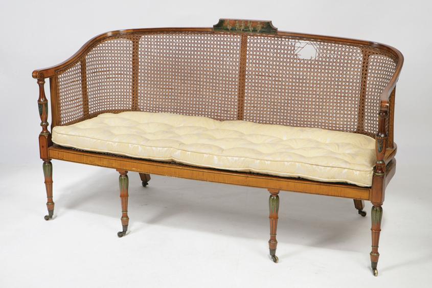 Appraisal: A SHERATON REVIVAL PAINTED SATINWOOD THREE SEATER SOFA the satinwood