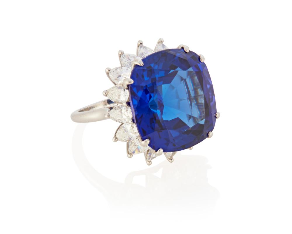 Appraisal: A TANZANITE AND DIAMOND RINGA tanzanite and diamond ring Platinum