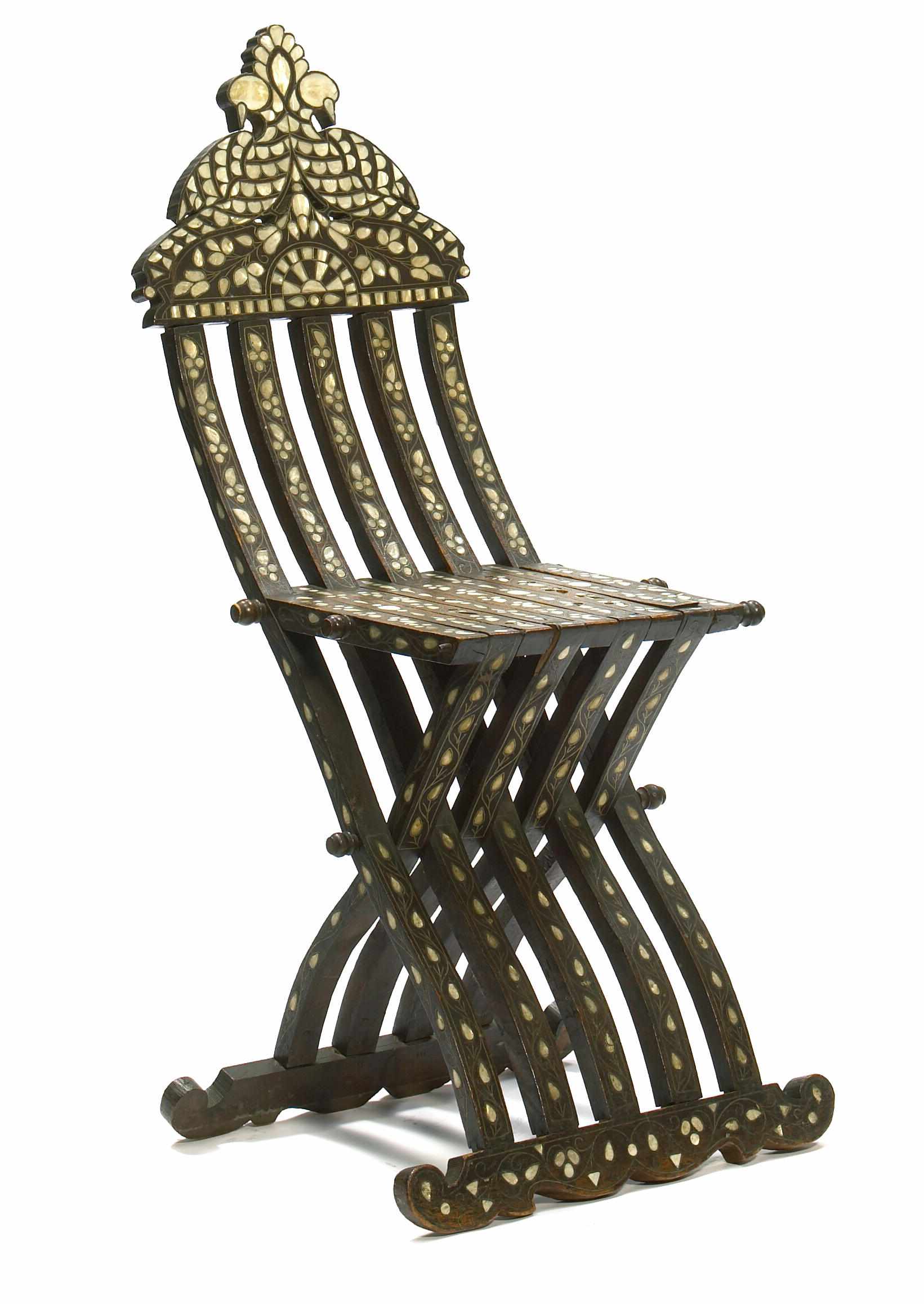 Appraisal: A Moorish mother of pearl inlaid wood side chair height