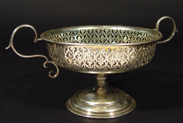 Appraisal: Edwardian two handled silver bon-bon dish with pierced floral decoration