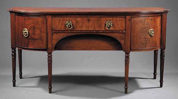 Appraisal: A George IV Mahogany Sideboard c the demilune shaped top