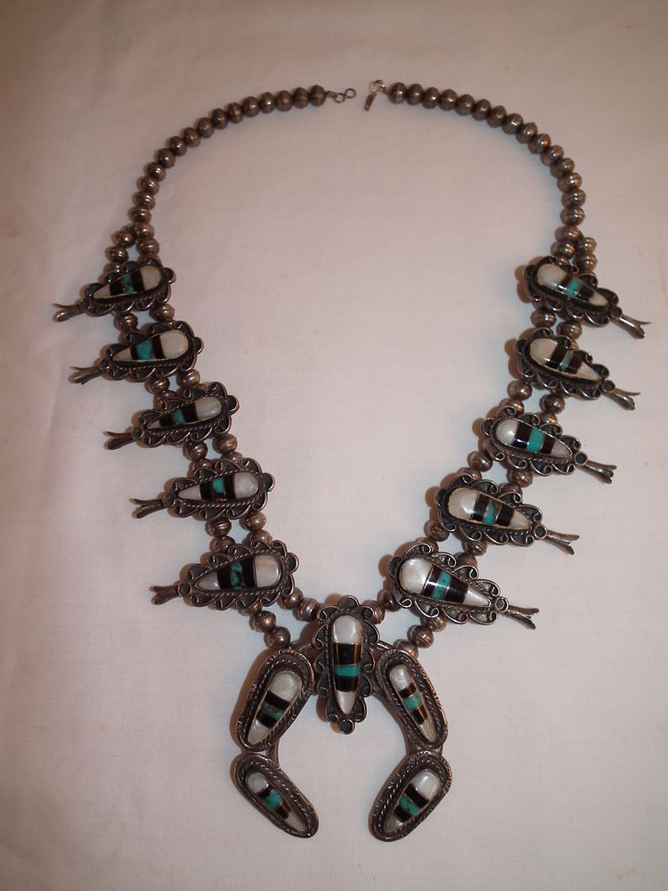 Appraisal: ZUNI SQUASH BLOSSOM NECKLACE Old Zuni squash blossom necklace with