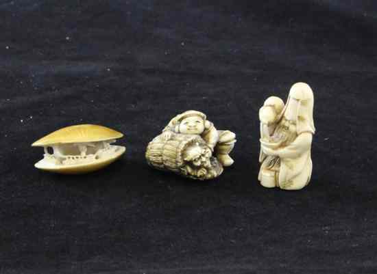 Appraisal: Three Japanese ivory netsuke early th century the first modelled