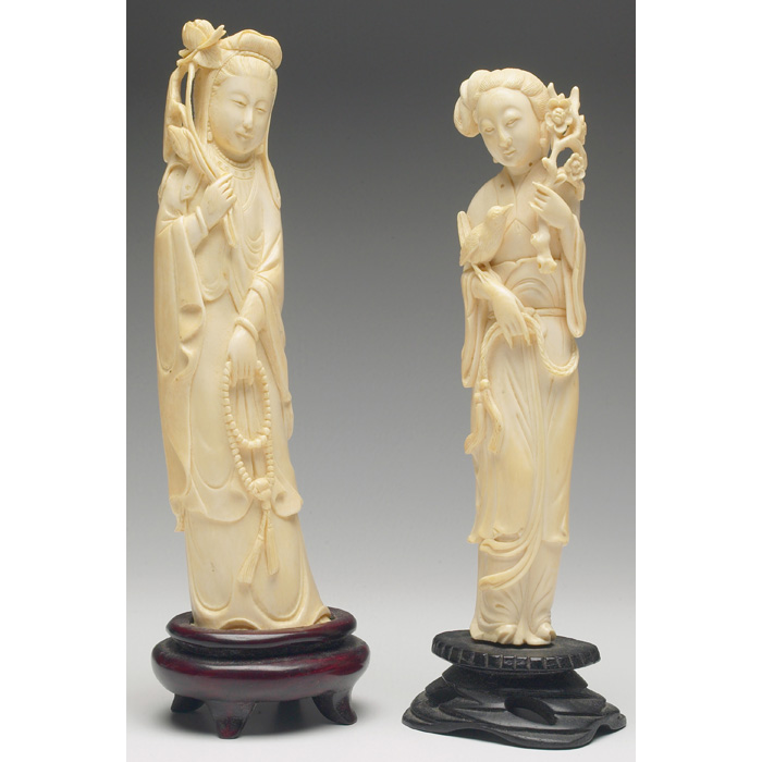 Appraisal: Chinese figurine intricately carved ivory woman holding long stem flowers