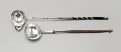 Appraisal: Two silver punch ladles one French with helmet-form bowl twisted