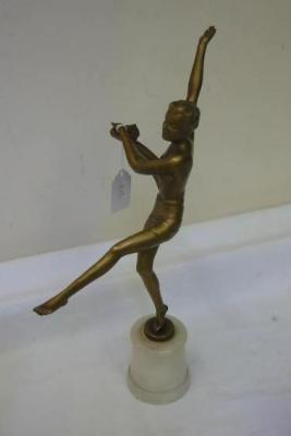 Appraisal: AN ART DECO GILDED SPELTER FIGURE of a female dancer