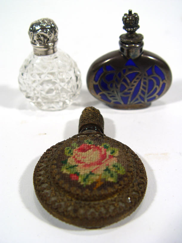 Appraisal: Three scent bottles - one cut glass with silver top