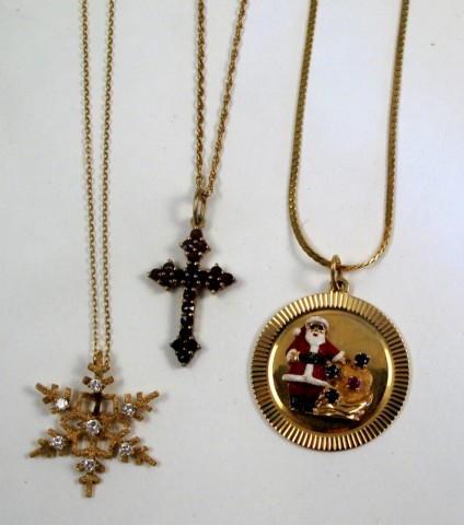 Appraisal: THREE PENDANT NECKLACES including a k gold Christmas pendant and