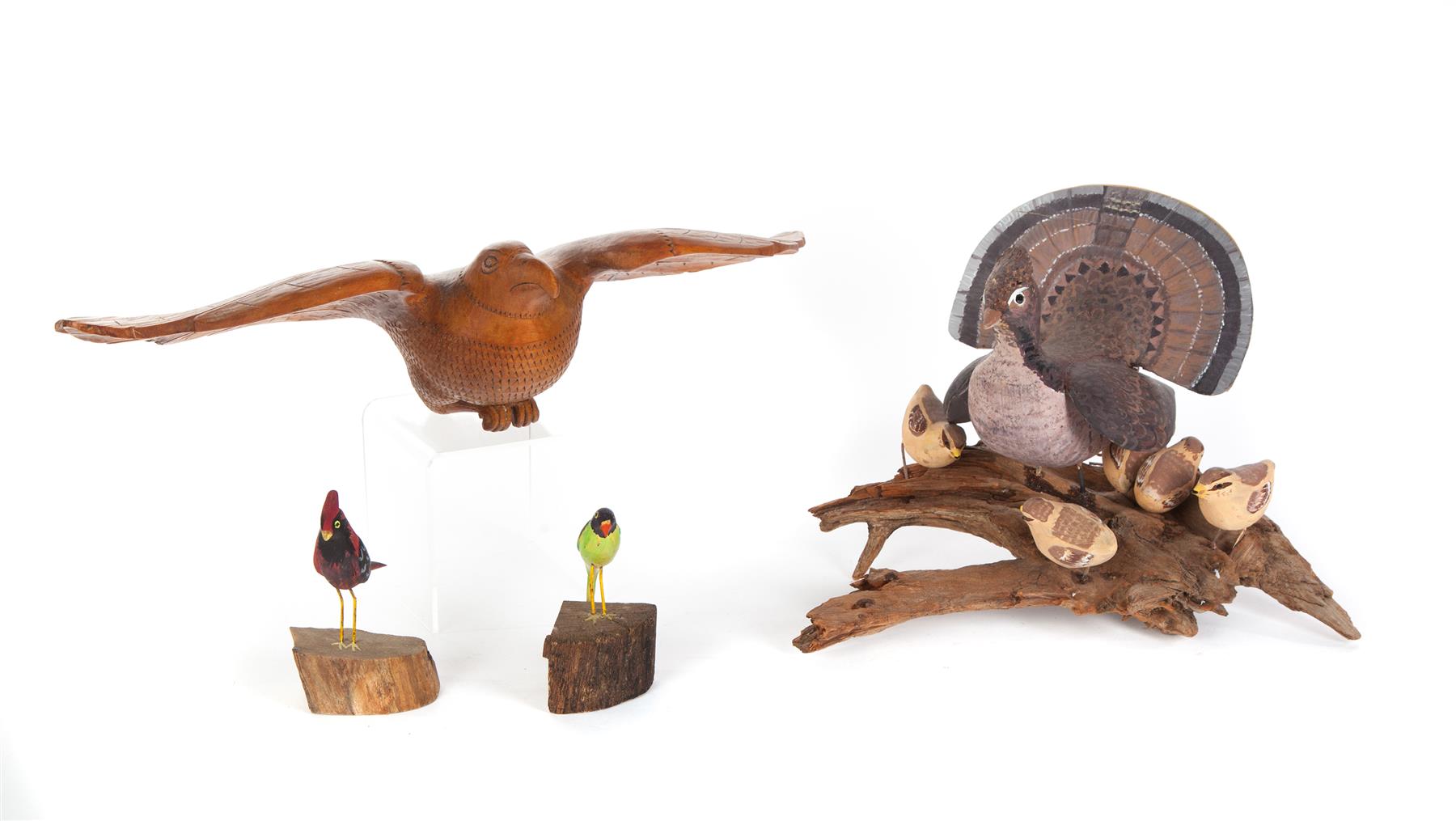 Appraisal: FOUR AMERICAN FOLK ART BIRD CARVINGS Twentieth century Cardinal and