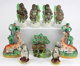 Appraisal: lot of English Staffordshire figural groups depicting safari animals consisting