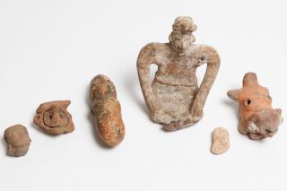 Appraisal: Pre Comprising seated figure monkey-shaped whistle stone beads and more