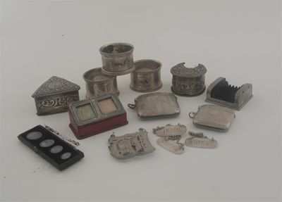 Appraisal: Miscellaneous small items three napkin rings three small wine labels