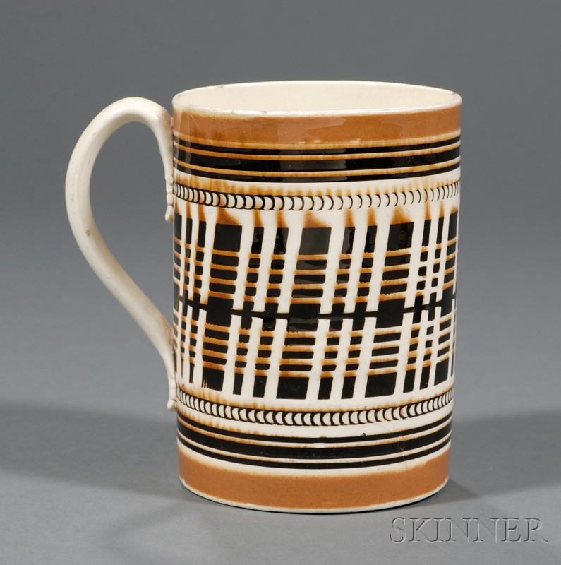 Appraisal: Mochaware Quart Mug Britain c with light and dark brown