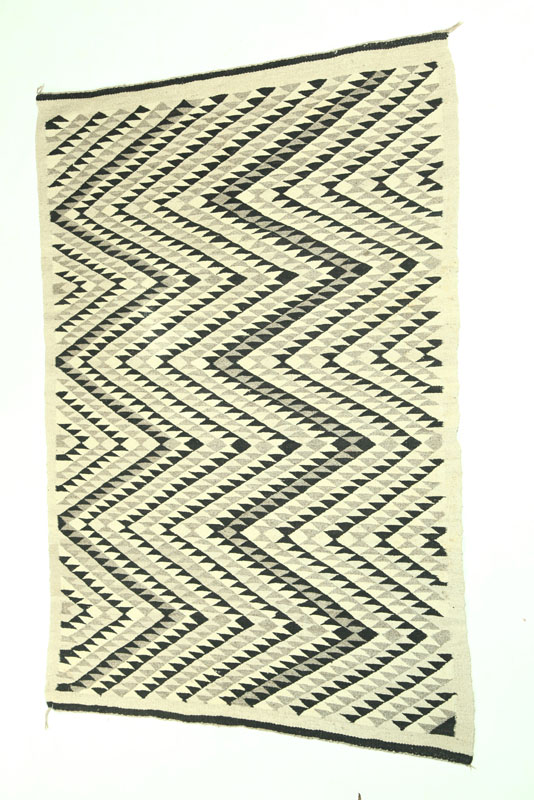 Appraisal: NAVAJO RUG First half- th century wool Serrated zigzags in