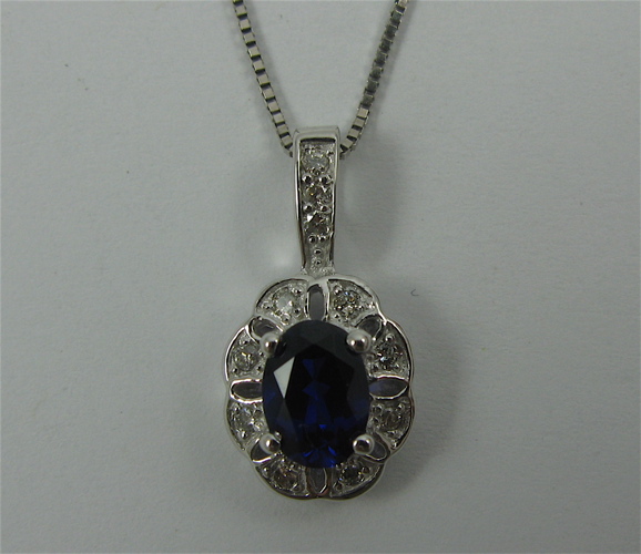 Appraisal: SAPPHIRE DIAMOND AND K GOLD PENDANT NECKLACE the pendant suspended