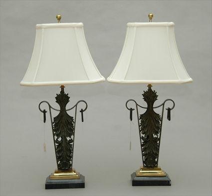 Appraisal: Pair of Cast-Iron Lamps with Marble Bases sold without shades