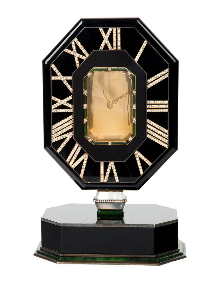 Appraisal: A CARTIER CITRINE ONYX CHRYSOPRASE SILVER AND DIAMOND 'MYSTERY CLOCK'