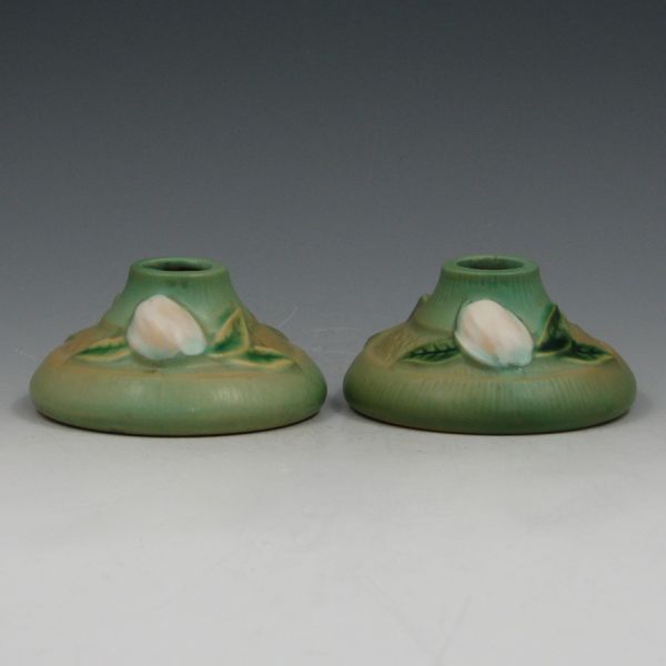 Appraisal: Pair of Roseville Gardenia green candleholders Marked Roseville USA Spider