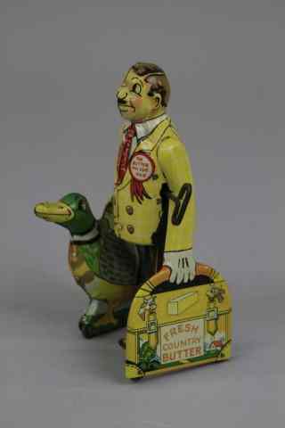 Appraisal: MARX BUTTER AND EGG MAN Lithographed tin wind up toy