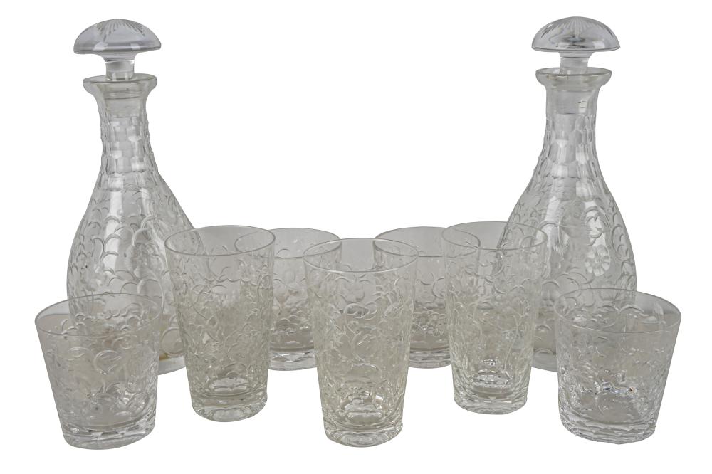 Appraisal: SET OF THARAUD DESIGNS ETCHED GLASSWAREcomprising two decanters with stoppers