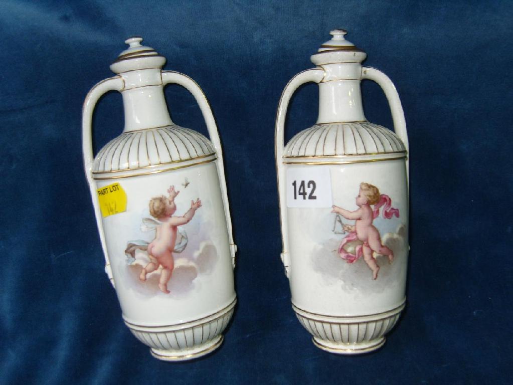 Appraisal: A pair of late th century Wedgwood -handled cream ground