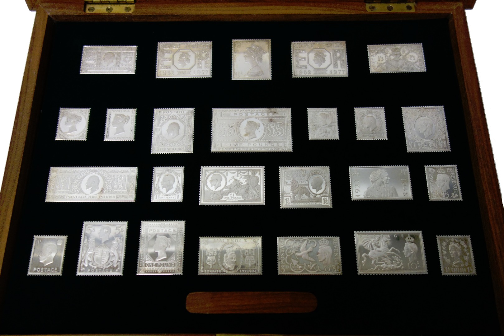 Appraisal: A set of twenty-five silver replica postage stamp ingots with