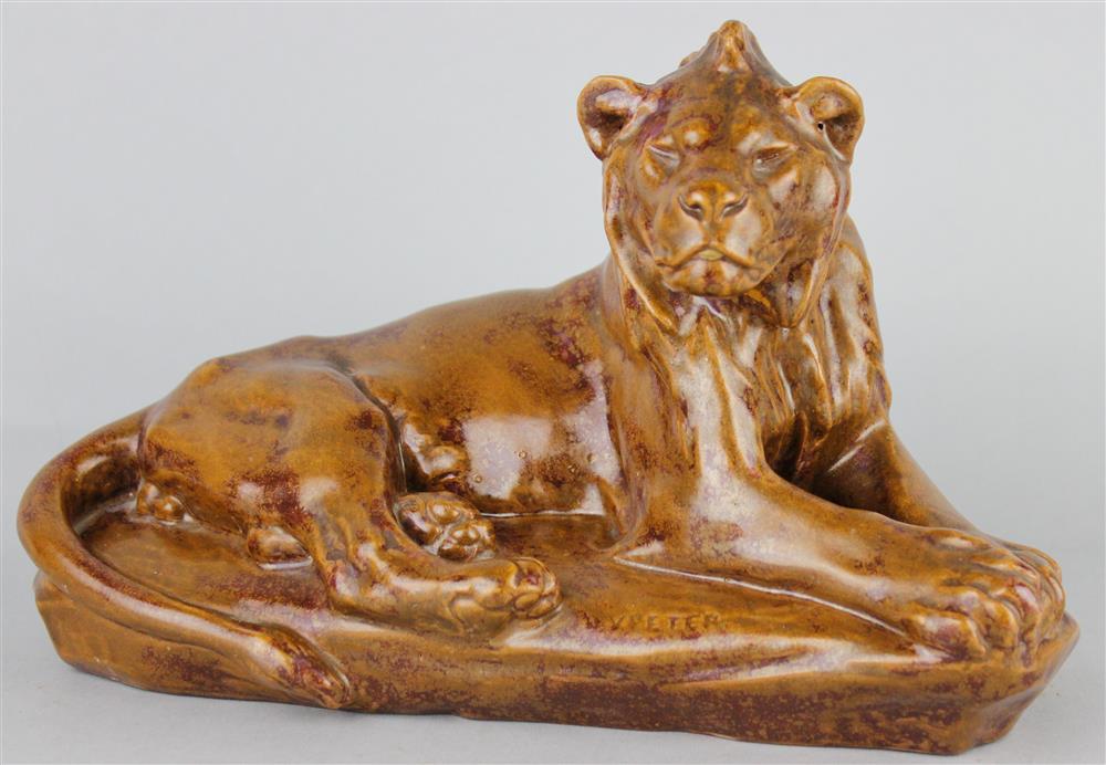 Appraisal: SEVRES EARTHENWARE MODEL OF A LION black printed mark and