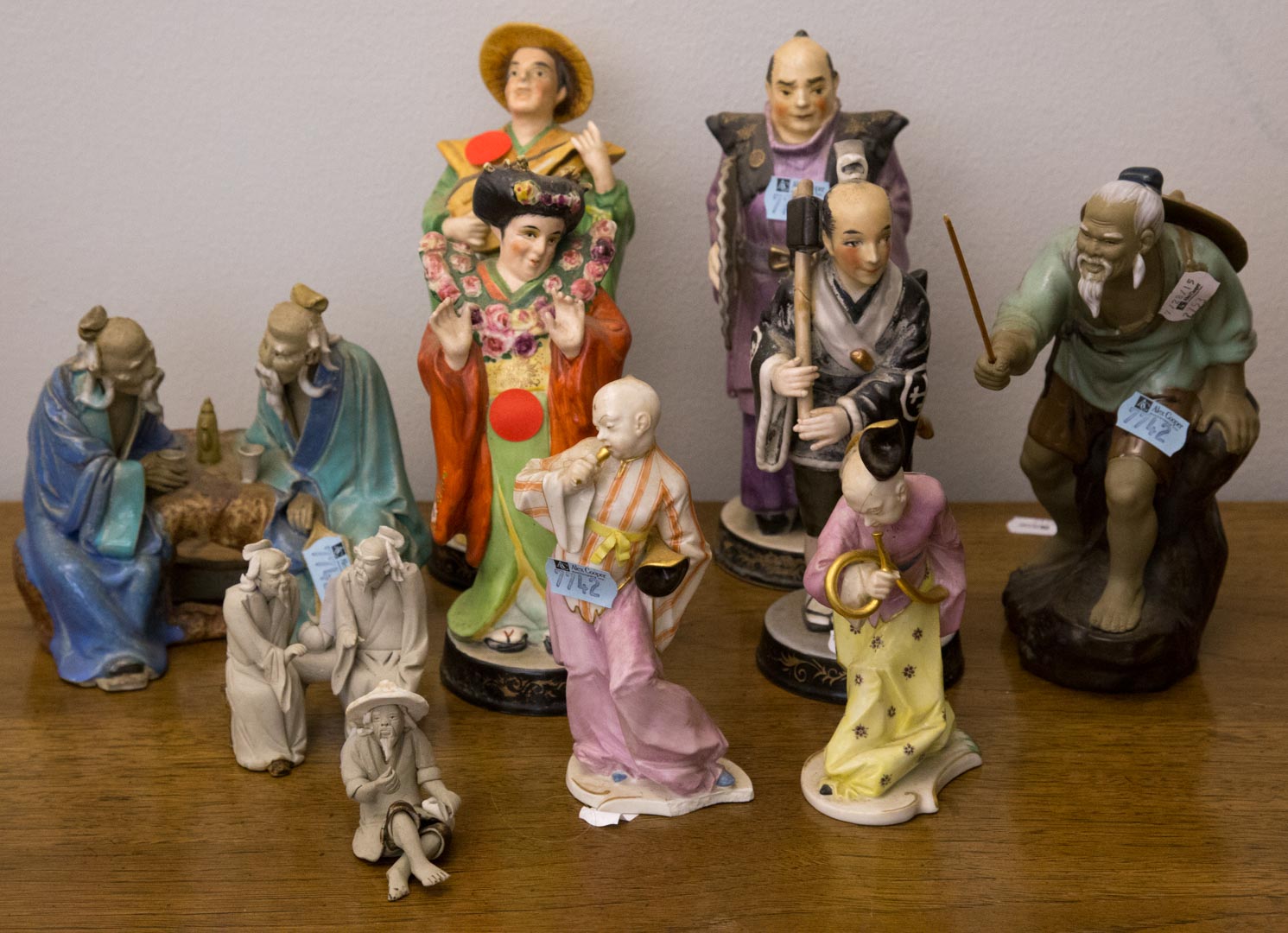 Appraisal: Assorted oriental style figures