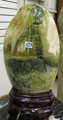 Appraisal: JADE MOUNTAIN the boulder of green striated polished jade in