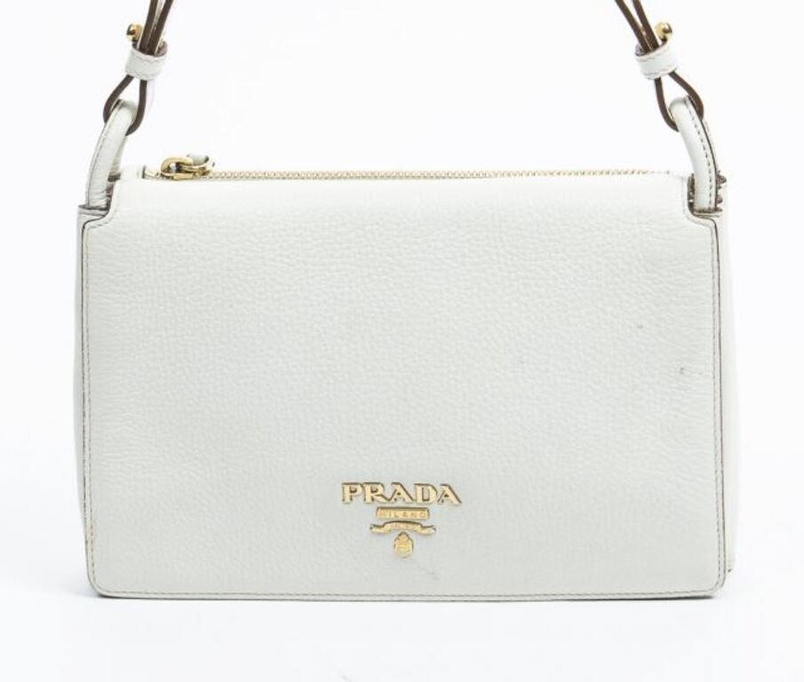 Appraisal: Prada front flap crossbody bag in ivory grained leather with