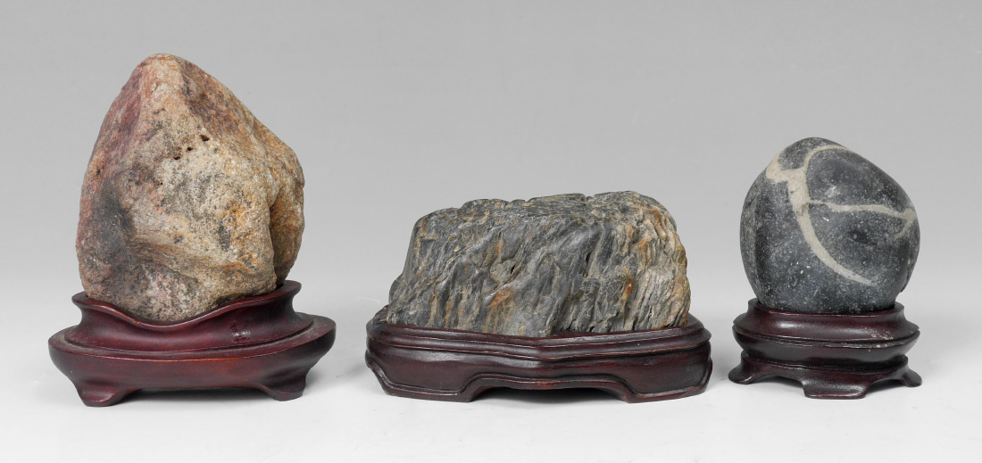 Appraisal: CHINESE SCHOLAR STONES ON STANDS An assembled collection of scholar