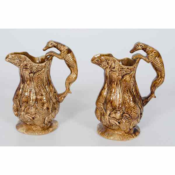 Appraisal: Pair of Rockingham Brown Glaze Pitchers American th century a