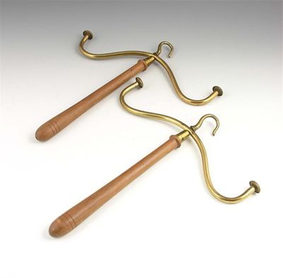 Appraisal: A pair of turned pine and brass portable wig holders