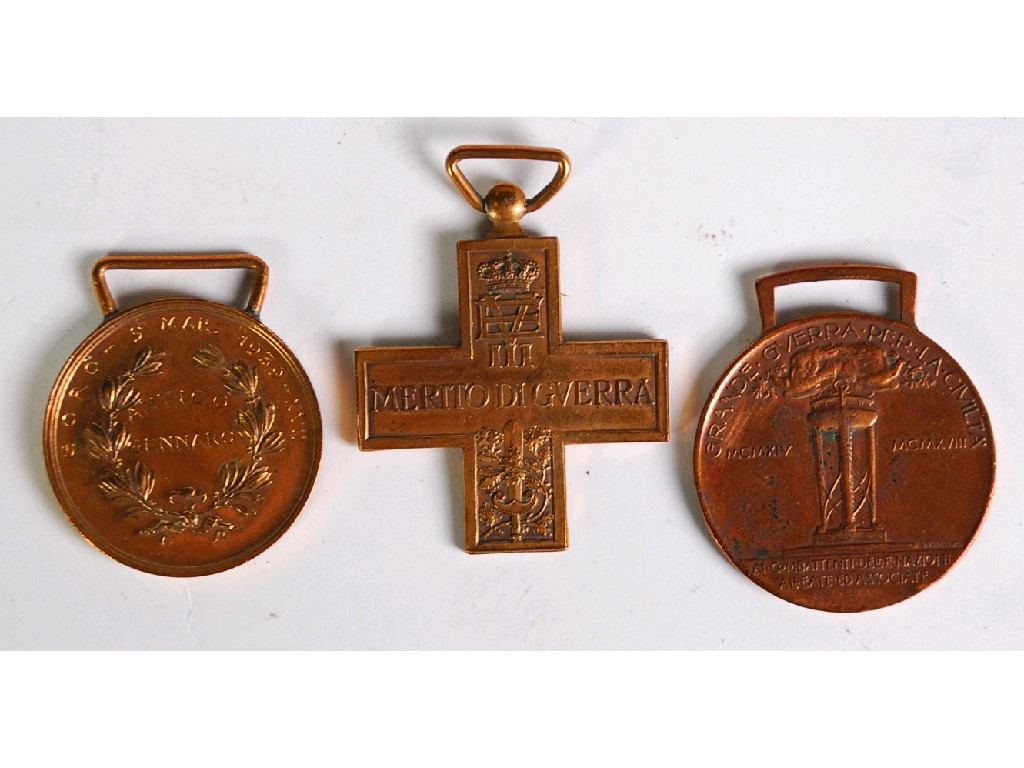 Appraisal: THREE ITALIAN WORLD WAR II MEDALS two circular and inscribed