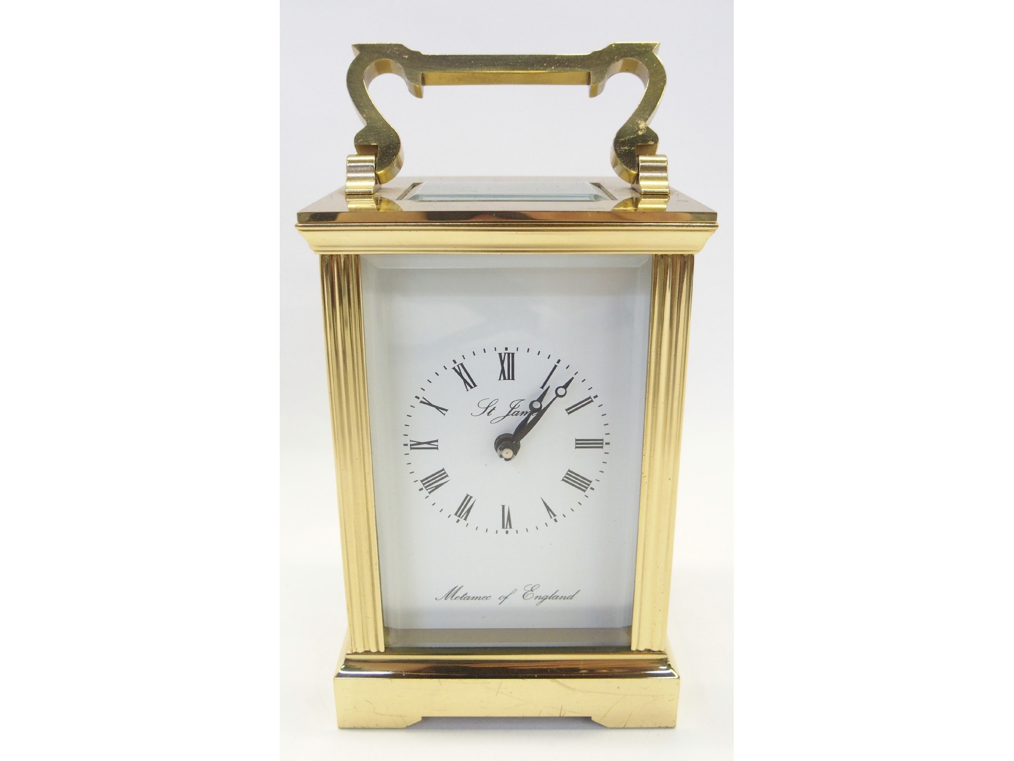 Appraisal: Metamac brass and glass carriage clock