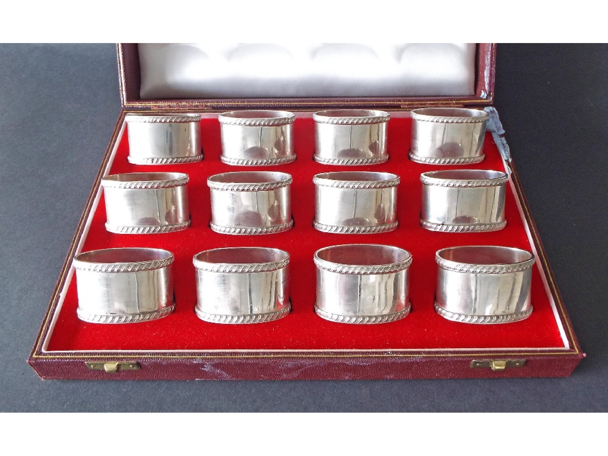 Appraisal: Good cased set of twelve silver oval napkin rings with