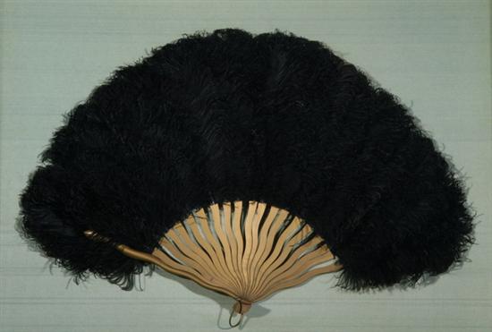 Appraisal: FRENCH BLACK OSTRICH PLUME FAN early th century With giltwood