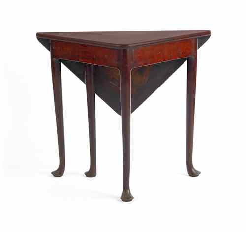 Appraisal: George II mahogany drop leaf corner table ca h w