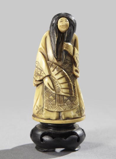 Appraisal: Japanese Meiji Carved Patinated and Polished Ivory Cabinet Figure of