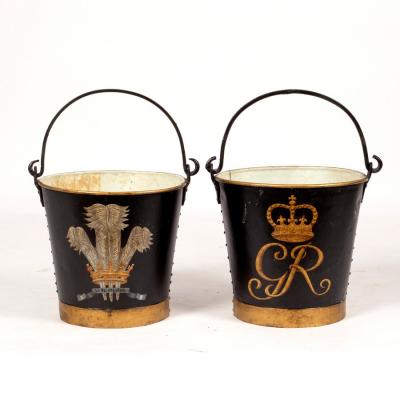 Appraisal: A pair of galvanized pails ebonised and painted with the